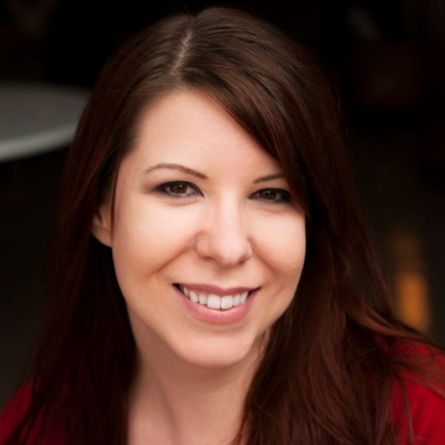 Professional headshot showing an individual smiling