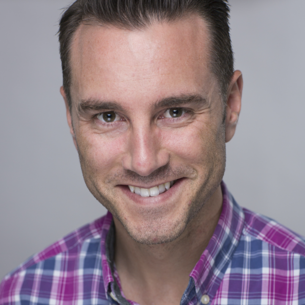 Professional headshot showing an individual smiling