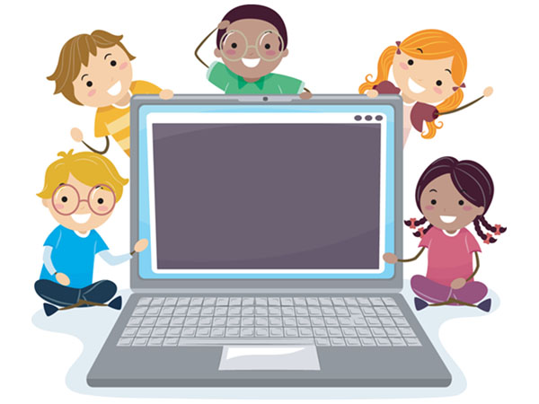 Children gathered around a large laptop smiling together.