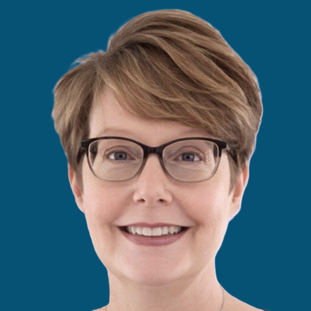 Headshot of a woman with short brown hair and glasses.